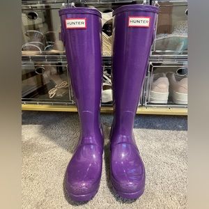 Brand new Hunter boots never worn. Sparkly purple.